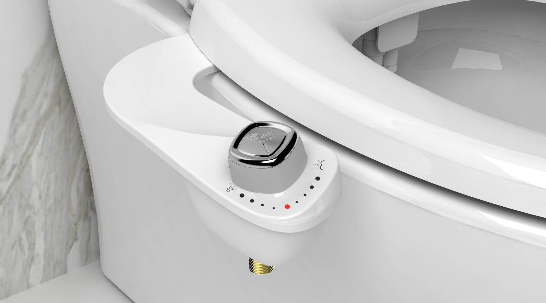 Extreme close-up of a silver, rounded square Bio Bidet pearl bidet knob. No water line is connected.