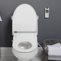 Bliss BB-2000 Bidet Seat Bidet installed on toilet in modern bathroom with remote mounted